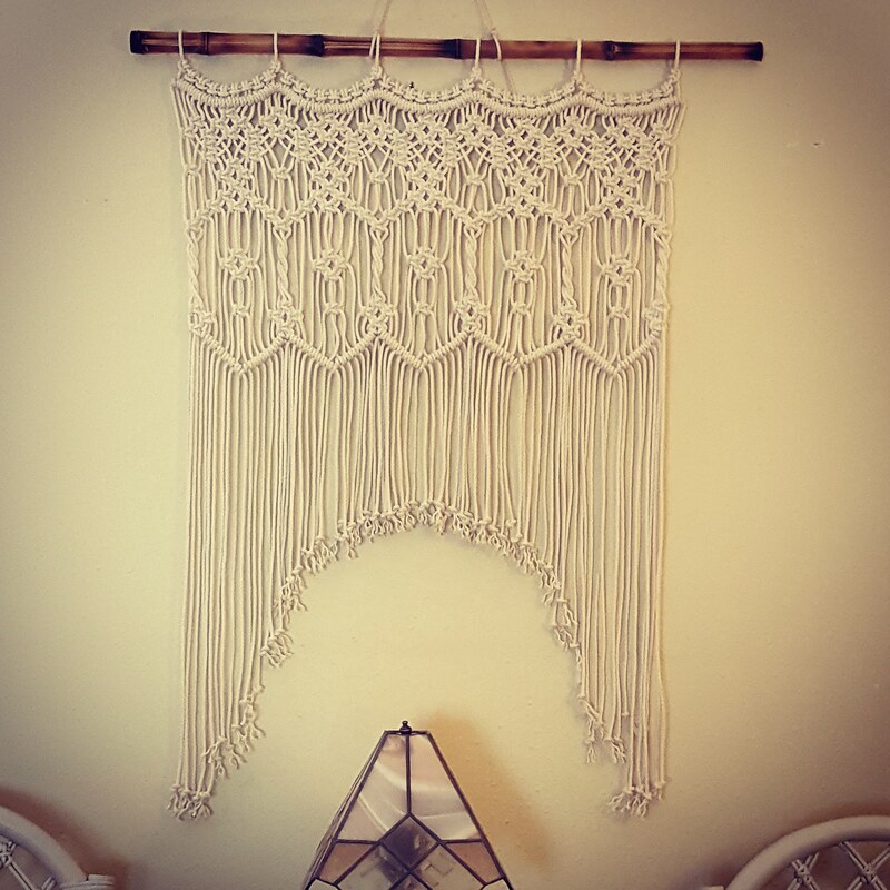 Macrame wall hanging with arch